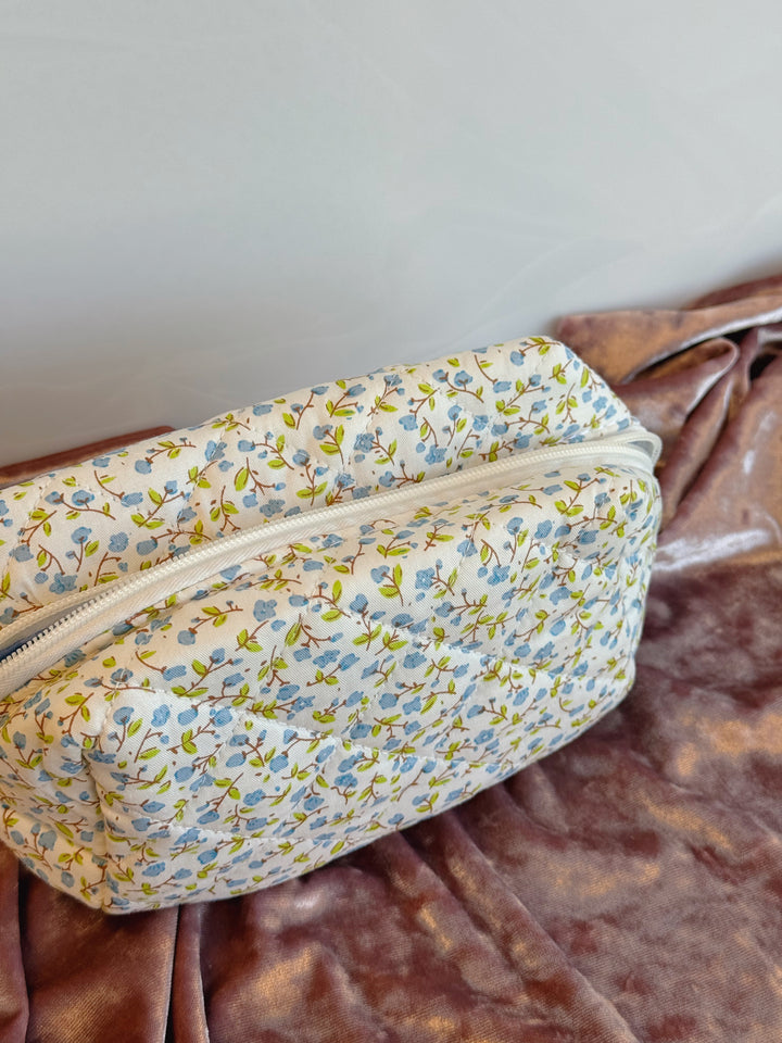 QUILTED FLORAL COSMETIC POUCH