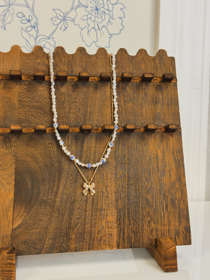 CERAMIC PORCELAIN PEARL BOW LAYER NECKLACE