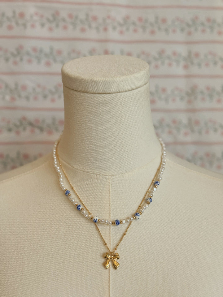 CERAMIC PORCELAIN PEARL BOW LAYER NECKLACE