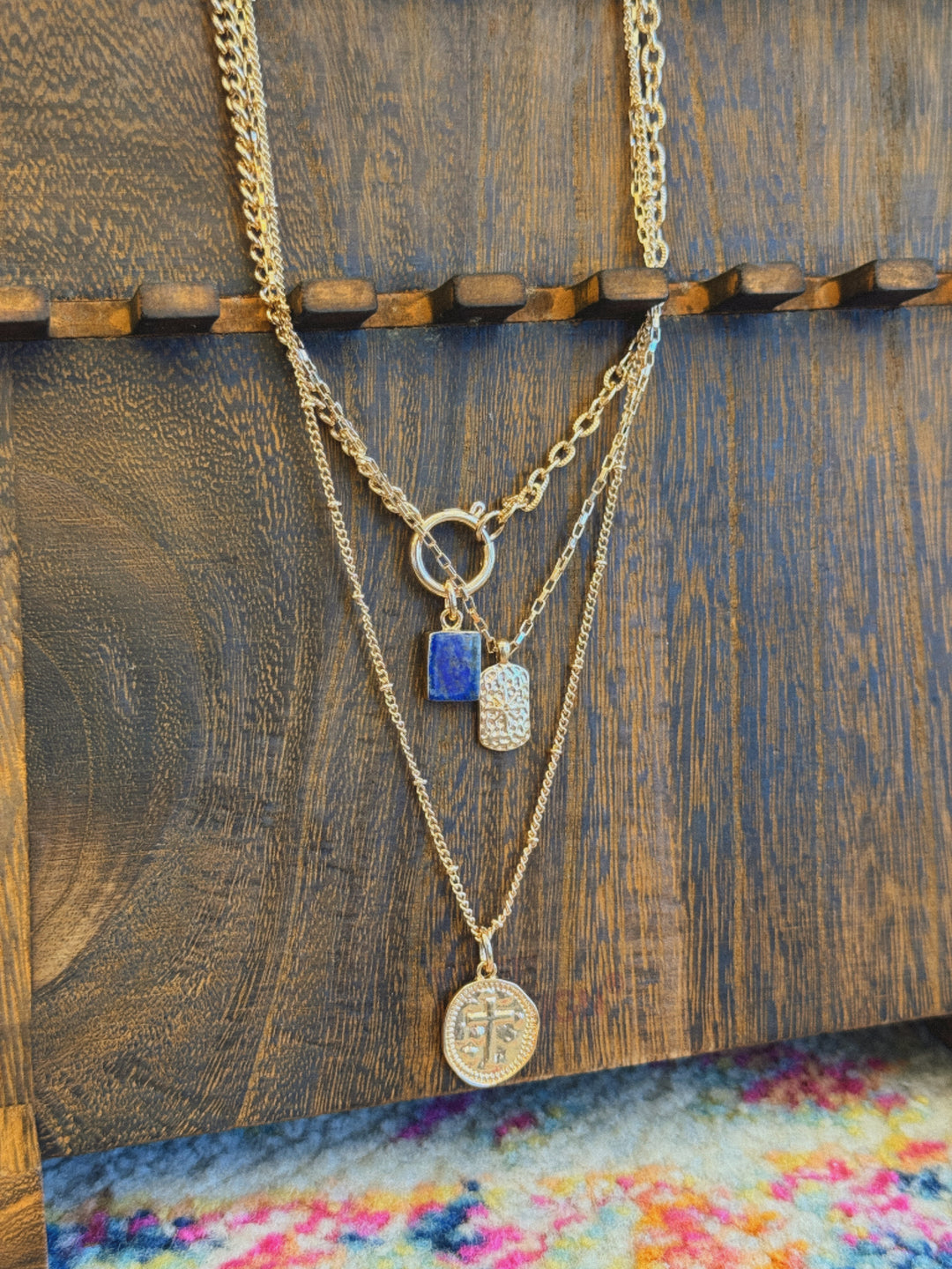 LAYER CELESTIAL CROSS BLUE STONE CHARM NECKLACE