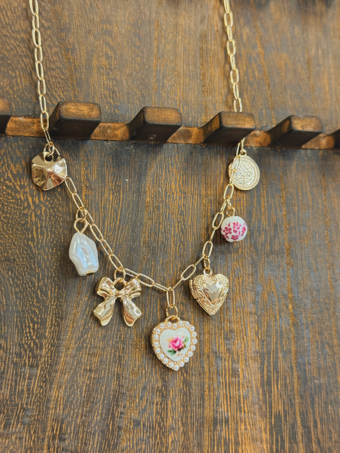 BOW HEART CHARM NECKLACE