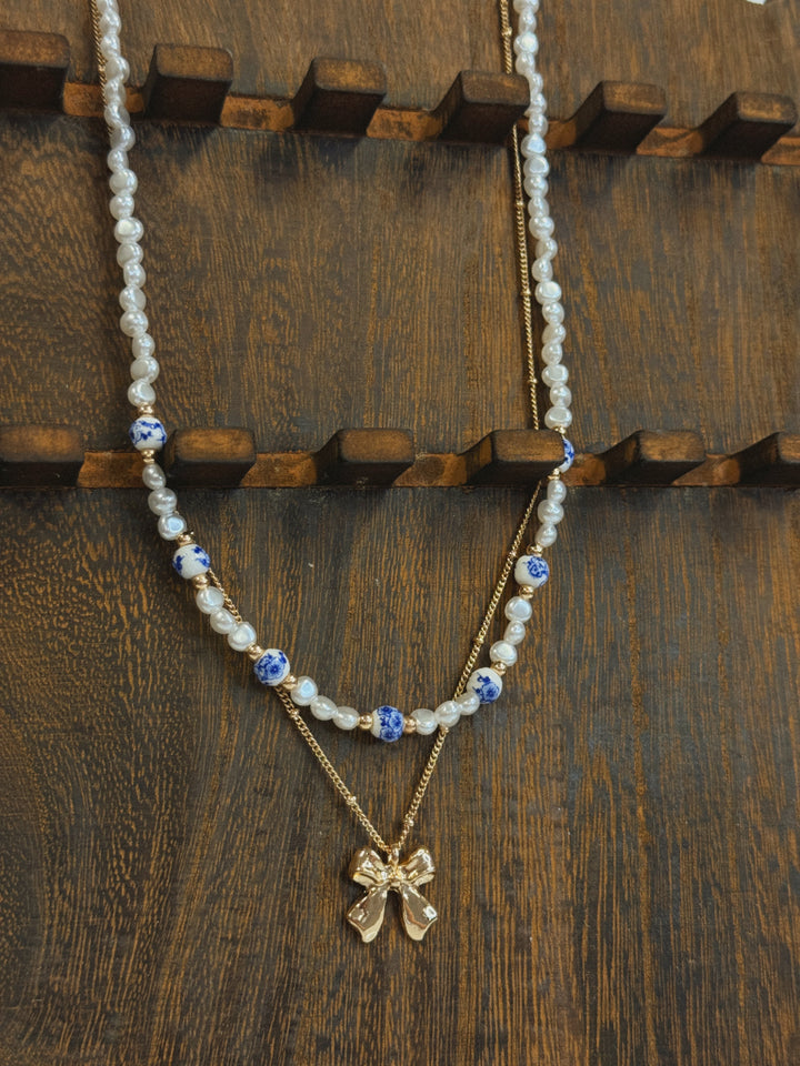 CERAMIC PORCELAIN PEARL BOW LAYER NECKLACE